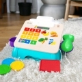 BABY EINSTEIN Pokladnica obchodná Magic Touch HAPE 9m+