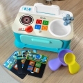 BABY EINSTEIN Hračka hudobná Kuchynka Magic Touch Kitchen™ Pretend to Cook HAPE 9m+